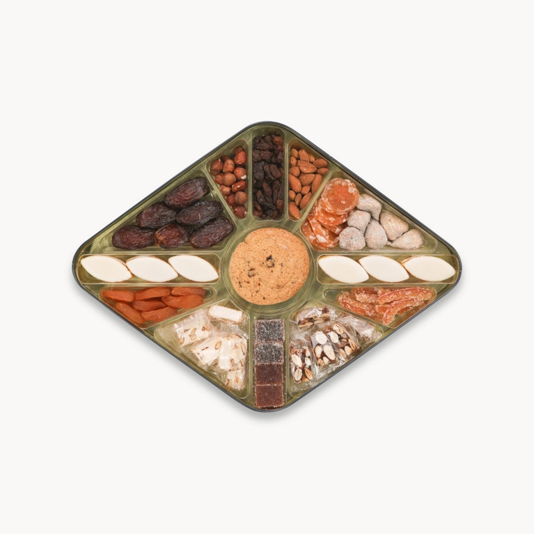 Coffret des 13 Desserts de Provence ouvert, laissant apparaître les produits à l’intérieur.